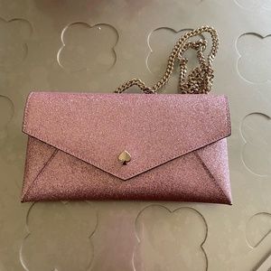 pink sparkly Kate spade convertible clutch with chain strap